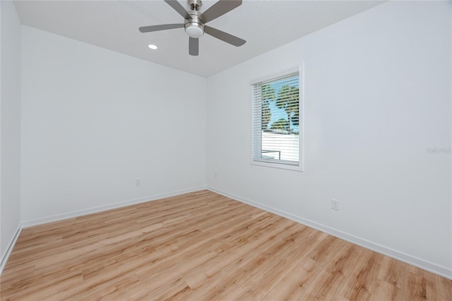 3402 E 28th Ave Unit 7, Tampa, FL 33605 - unfurnished room featuring wood finished floors, baseboards, and ceiling fan