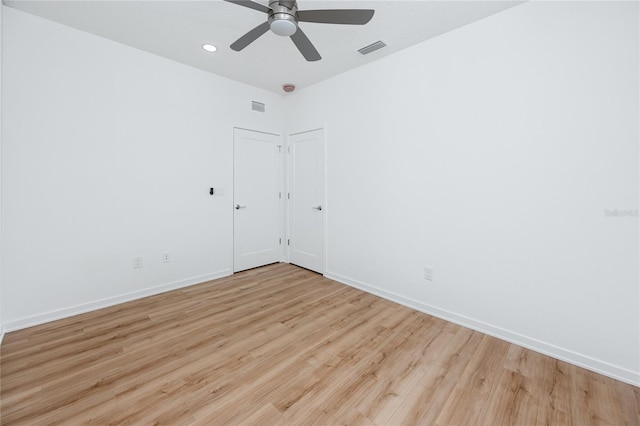 3402 E 28th Ave Unit 7, Tampa, FL 33605 - spare room with light wood finished floors, baseboards, a ceiling fan, and recessed lighting