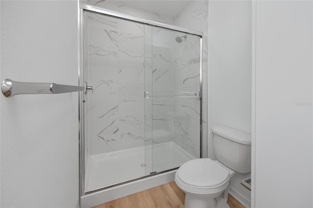 3402 E 28th Ave Unit 7, Tampa, FL 33605 - full bathroom with a marble finish shower, wood finished floors, and toilet