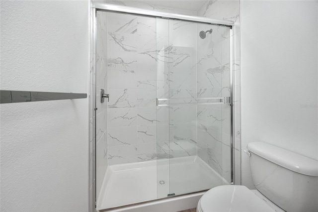 3402 E 28th Ave Unit 7, Tampa, FL 33605 - full bathroom featuring toilet and a marble finish shower
