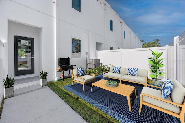 3402 E 28th Ave Unit 7, Tampa, FL 33605 - fenced backyard with an outdoor living space and a patio