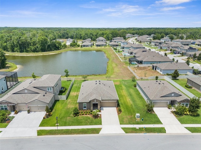 birds eye view of property featuring a residential view and a water view