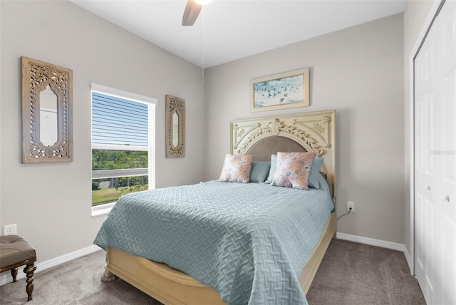 bedroom featuring carpet, baseboards, a closet, and a ceiling fan