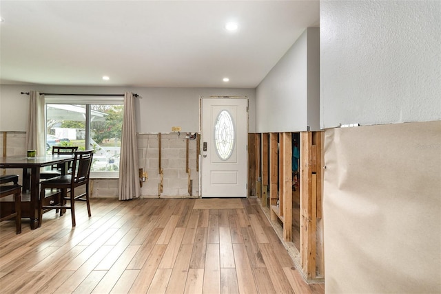 entryway with recessed lighting and light wood-style floors