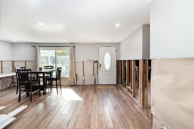 entryway featuring light wood finished floors and recessed lighting