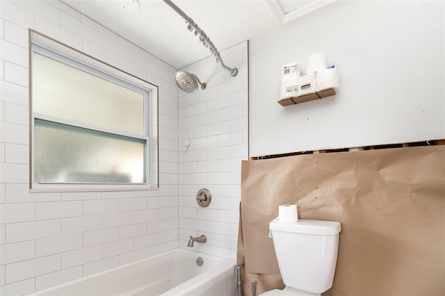 bathroom with toilet and shower / bathtub combination