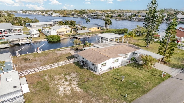 bird's eye view with a water view and a residential view