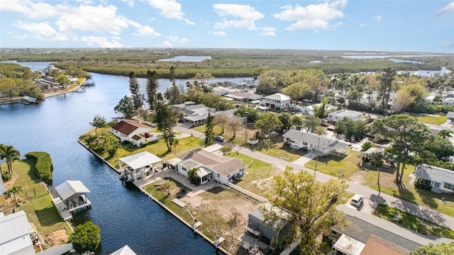 aerial view with a residential view and a water view