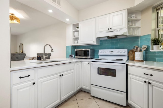 kitchen with white electric stove, open shelves, stainless steel microwave, a sink, and under cabinet range hood