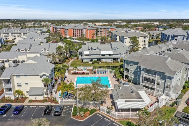 birds eye view of property with a residential view