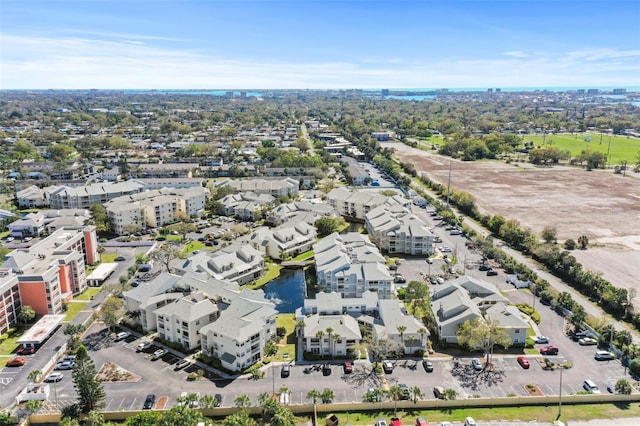 birds eye view of property with a residential view