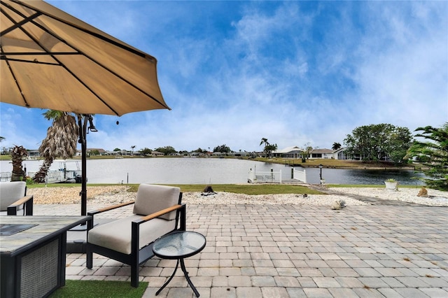 view of patio featuring a water view