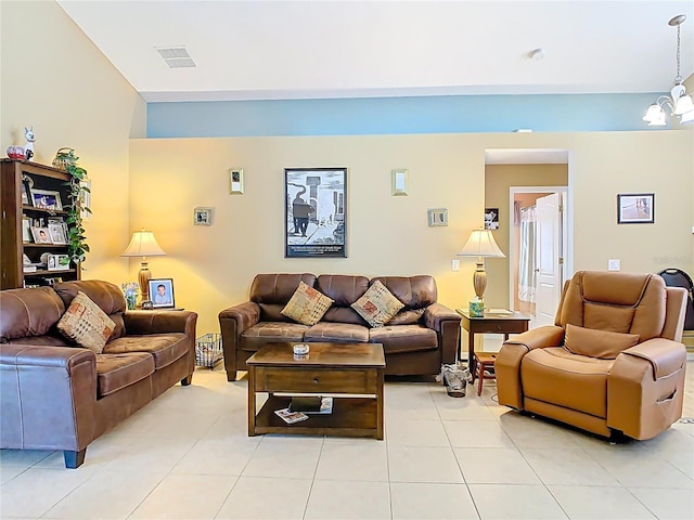 living room featuring a chandelier, visible vents, and light tile patterned floors