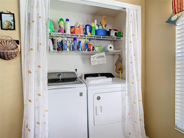 laundry room featuring laundry area and washing machine and clothes dryer