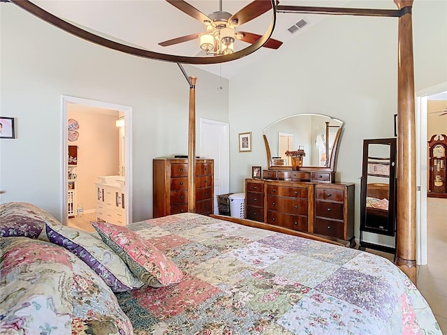 bedroom featuring visible vents, high vaulted ceiling, ensuite bathroom, and a ceiling fan