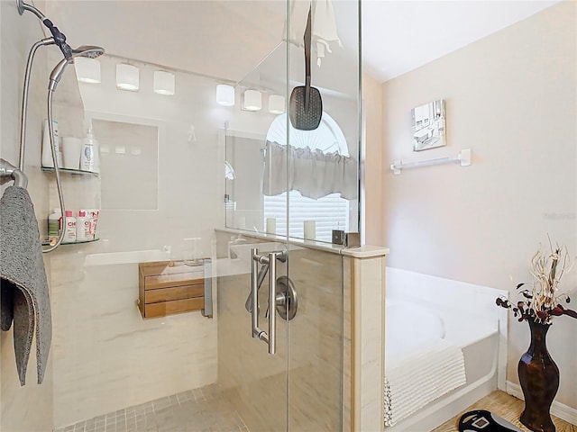 full bathroom with a shower with shower door and a bath