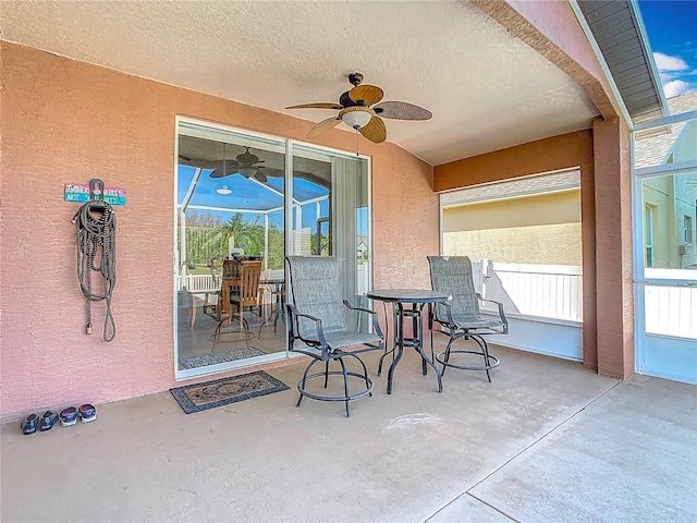 view of patio with ceiling fan