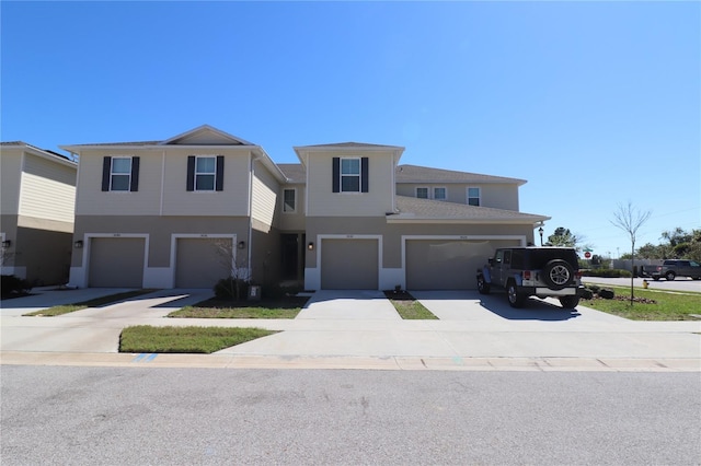 view of front of property with an attached garage and driveway