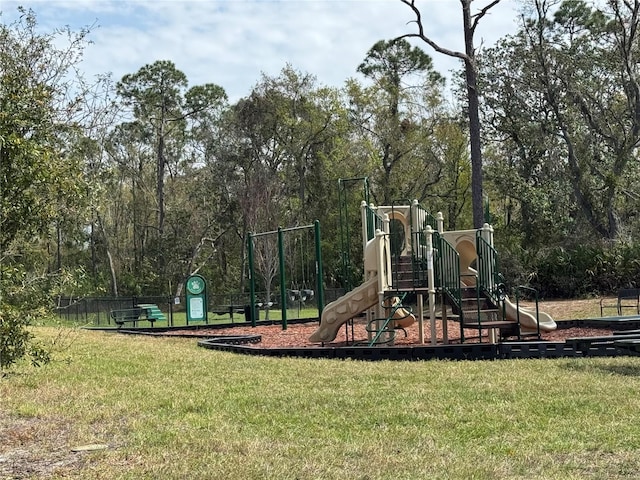 communal playground with a lawn