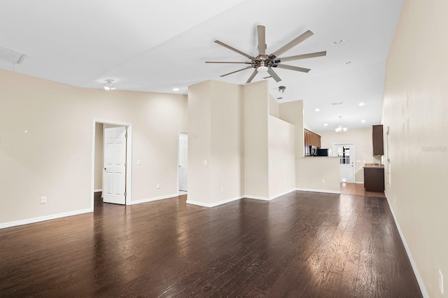 unfurnished living room featuring ceiling fan, baseboards, dark wood-style floors, and recessed lighting