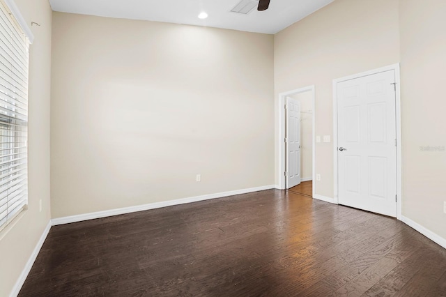 empty room with visible vents, baseboards, recessed lighting, wood finished floors, and a ceiling fan