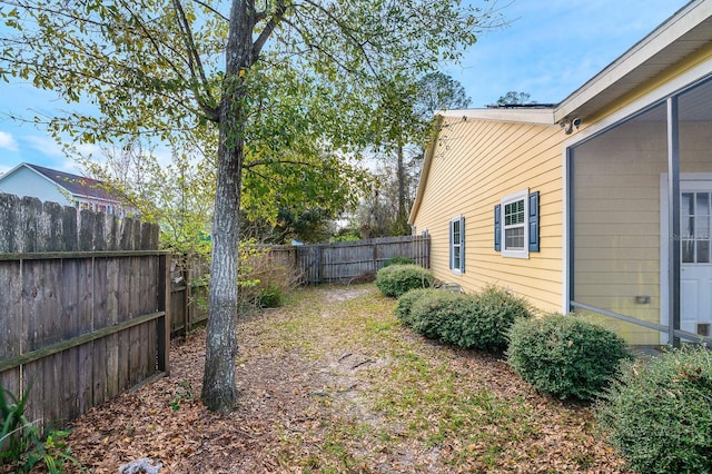 view of yard featuring fence