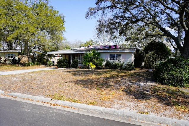 view of front of house with a carport