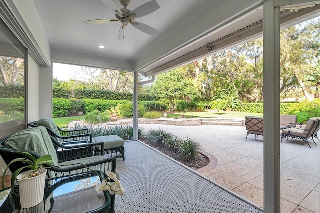 view of patio featuring ceiling fan