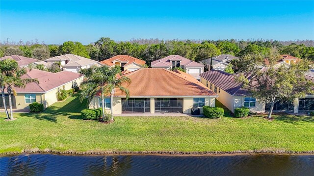 aerial view with a water view and a residential view