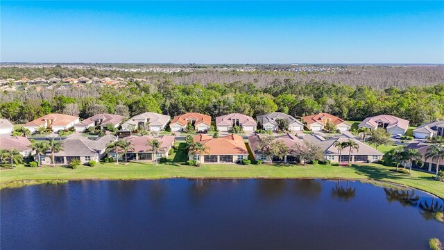 aerial view featuring a residential view and a water view