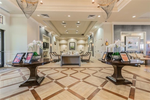 interior space featuring visible vents and a notable chandelier