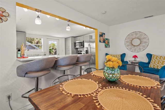 dining area with visible vents