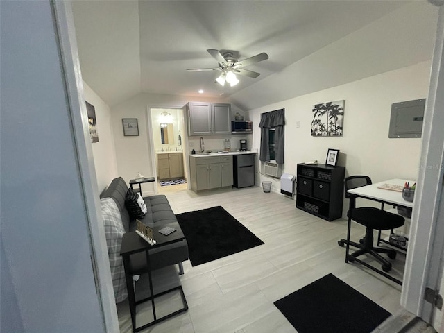 living room with electric panel, lofted ceiling, and ceiling fan