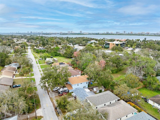 drone / aerial view with a view of city and a water view