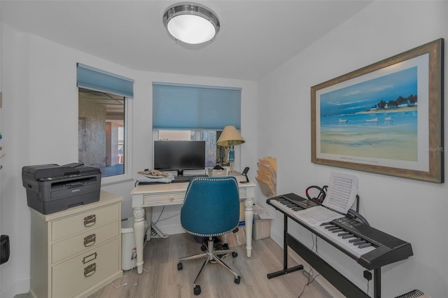 office area with light wood-style flooring