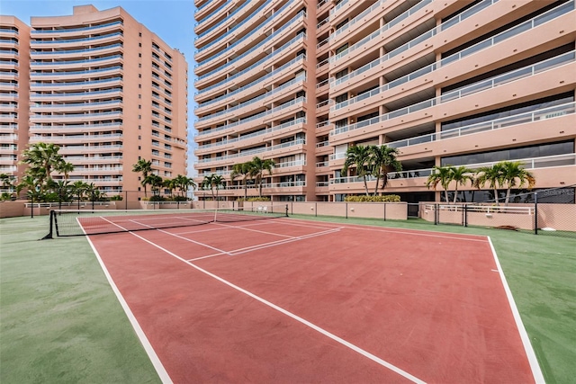 view of sport court featuring community basketball court and fence