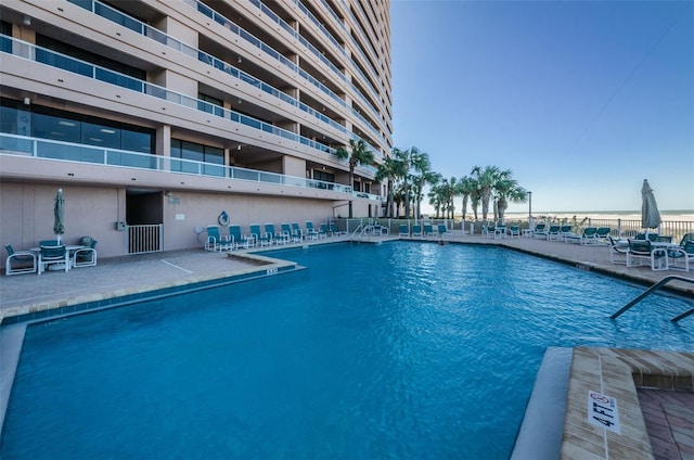 view of pool featuring a patio