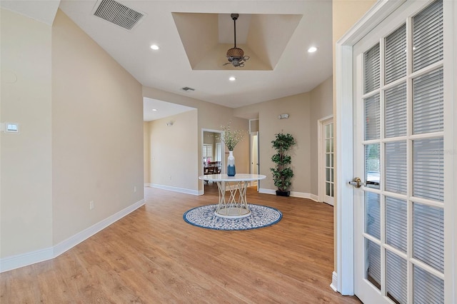 foyer entrance with recessed lighting, visible vents, baseboards, and light wood-style floors