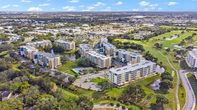 aerial view featuring a view of city and a water view