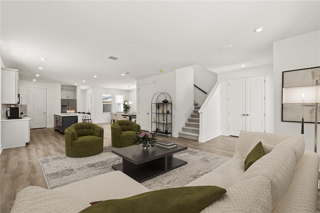 408 W Paris St, Tampa, FL 33604 - living area featuring stairs, recessed lighting, and light wood finished floors