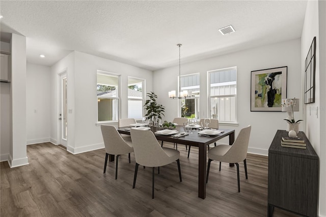 408 W Paris St, Tampa, FL 33604 - dining area with dark wood finished floors, a chandelier, recessed lighting, and a textured ceiling