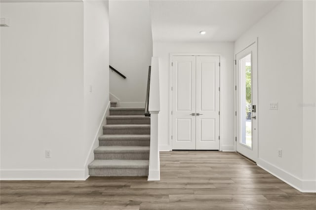 408 W Paris St, Tampa, FL 33604 - entrance foyer featuring wood finished floors, stairway, and recessed lighting