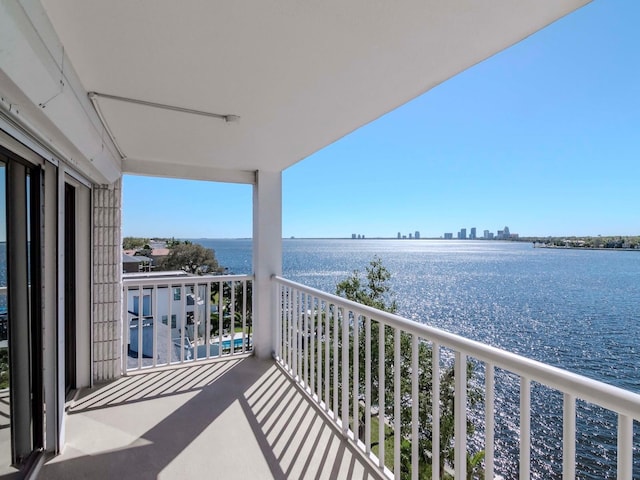 balcony with a city view and a water view