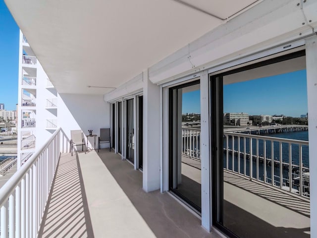 balcony with a city view and a water view