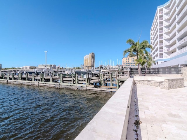 view of dock with a water view and boat lift