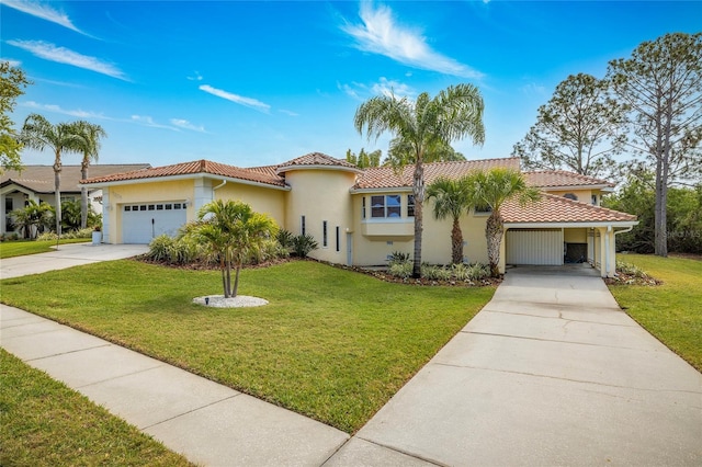 mediterranean / spanish home featuring stucco siding, a front yard, driveway, and a tile roof