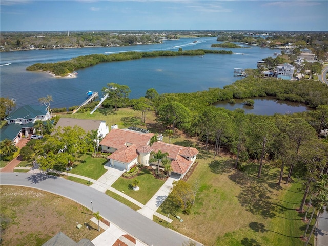 birds eye view of property featuring a water view