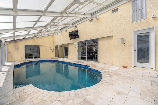 pool with a patio