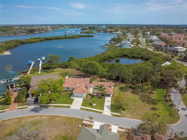 bird's eye view featuring a residential view and a water view