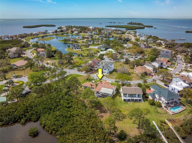 aerial view featuring a residential view and a water view